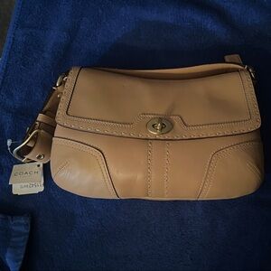 Coach Tan Leather Turnlock Wristlet Clutch